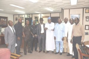 ES/CEO NSC flanked by AMJON members