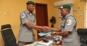 Comptroller Wale Adeniyi and DC Attah during the hand over from Wale to Attah as national PRO, Nigeria Customs Service
